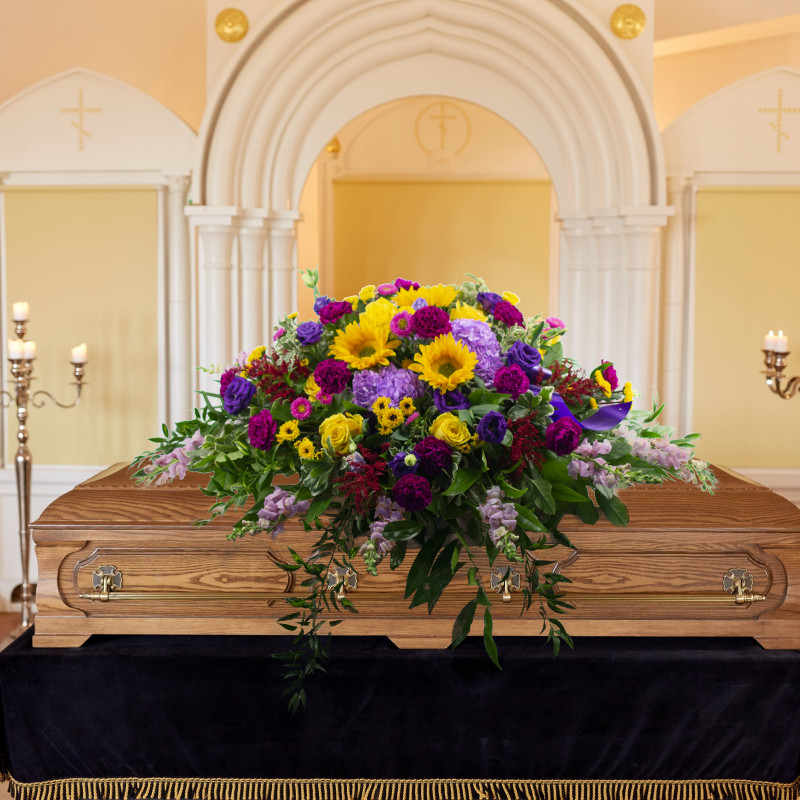 Sunlit Farewell Casket Spray - Same Day Delivery